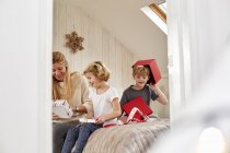 Christmas morning in a family home. — Stock Photo