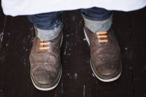 Baker wearing brown shoes — Stock Photo