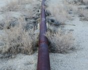 Pipeline on oil field — Stock Photo