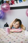 One year old girl at birthday party — Stock Photo