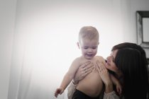 Woman playing with son. — Stock Photo