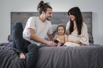 Young couple and their young son — Stock Photo