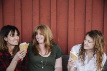 Women eating ice cream. — Stock Photo