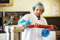Woman working in butchery — Stock Photo