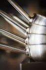 Stack of stainless steel pots — Stock Photo
