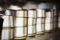 Stack of stainless steel pots — Stock Photo