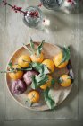 Wooden bowl of oranges — Stock Photo