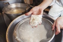 Chef preparing rice for the dishes. — Stock Photo