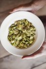 Plate of dried hops — Stock Photo