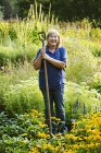 Female gardener at Waterperry Gardens — Stock Photo