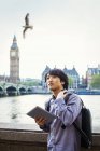 Japanese man by River Thames. — Stock Photo