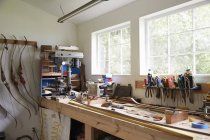 Workshop bench with components — Stock Photo