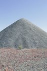 Gravel pile in desert — Stock Photo