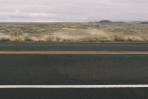 Estrada através do deserto pintado — Fotografia de Stock
