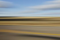 Blurred road and sky — Stock Photo