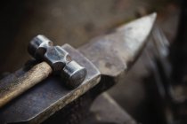 Hammer and small anvil — Stock Photo