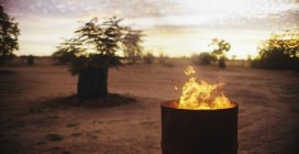 Fire burning in barrel — Stock Photo