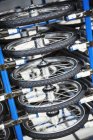 Bicycle wheels in bicycle factory. — Stock Photo