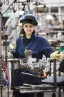 Female skilled factory worker — Stock Photo
