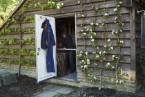 Garden shed workshop with plants — Stock Photo
