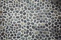 Patio with grey pebbles. — Stock Photo