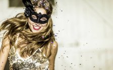 Young woman at confetti party. — Stock Photo