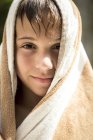 Boy wrapped in towel — Stock Photo