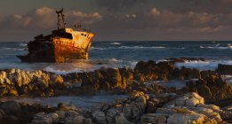 Rusting wreck of abandoned ship — Stock Photo