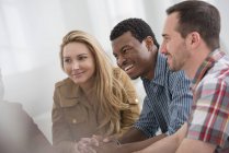 Small group of people talking while meeting in office. — Stock Photo