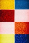 Multicolored pattern of rectangles of recycled construction paper. — Stock Photo