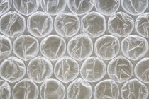 Close-up of bubble wrap packaging, full frame. — Stock Photo