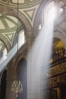 Interior of Mexico City Metropolitan Cathedral with sun rays shining through windows — Stock Photo