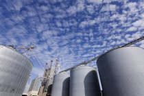 Silos against blue sky with clouds in Texas, USA — Stock Photo