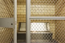 Empty jail holding cell in Dallas, Texas, USA — Stock Photo