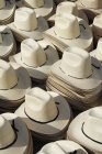 Stacks of traditional Mexican straw hats — Stock Photo