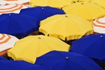 Colorful umbrellas in resort of Liguria, Italy, Europe — Stock Photo