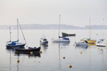 Moored ships and boats in harbor of England, UK — Stock Photo