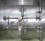 Closed vault door in commercial bank building interior, Chicago, Illinois, USA — Stock Photo