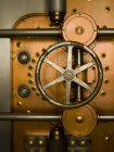 Tumbler on vault door in commercial bank building interior, Chicago, Illinois, USA — Stock Photo