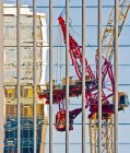 Distorted reflection of tower crane in building, Salt Lake City, USA — Stock Photo