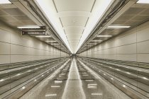 Empty airport walkway with sign and lights, Arlington, Virginia, USA — Stock Photo