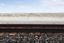 Railroad tracks through salt flats, Bonnaville Salt Flats, Utah, United States — Stock Photo
