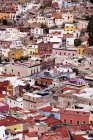 Aerial view of city skyline with houses and rooftops, full frame, Guanajuato, Mexico — Stock Photo