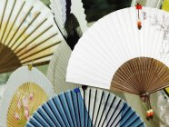 Oriental fans in paper store, full frame — Stock Photo