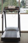 Treadmill machine with window view of town street, Edmonds, Washington, USA — Stock Photo