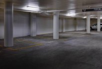 Parking garage in modern highrise building — Stock Photo