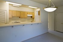 Apartment kitchen in new house at contraction site, Norfolk, Virginia, USA — Stock Photo
