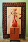 Decorative vase on wooden chest in Todos Santos, Baja California, Mexico — Stock Photo