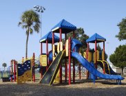 Playground equipment and palm trees in Bradenton, Florida, USA — Stock Photo