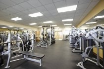 Exercise equipment in empty gym, Florida, USA — Stock Photo